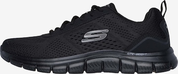 SKECHERS Matalavartiset tennarit 'TRACK - LESHUR' värissä musta: etupuoli