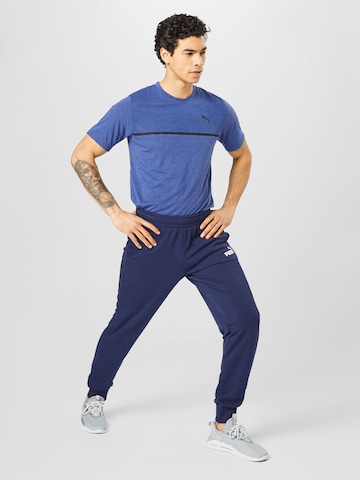 PUMA Tapered Sportbroek in Blauw