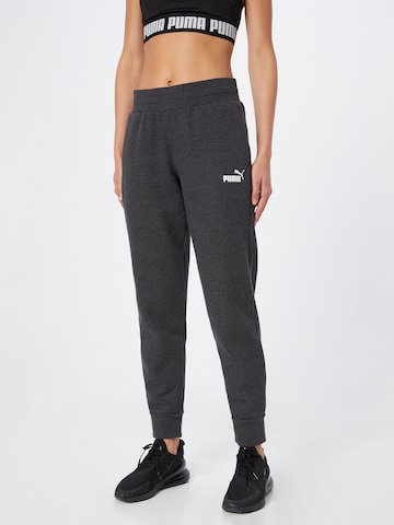 PUMA - Tapered Pantalón deportivo 'Essentials' en gris: frente