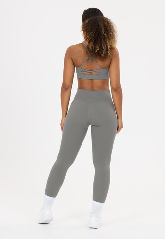 Athlecia Skinny Sports trousers 'Emarri' in Grey