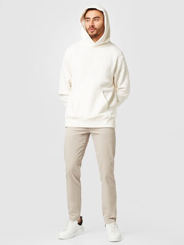 Felpa di Champion Authentic Athletic Apparel in beige