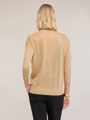 Cardigan MOTIVI en or