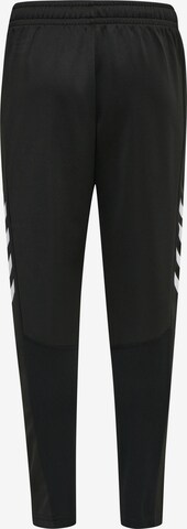 Coupe slim Pantalon de sport Hummel en noir