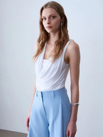 Top di Dilvin in bianco