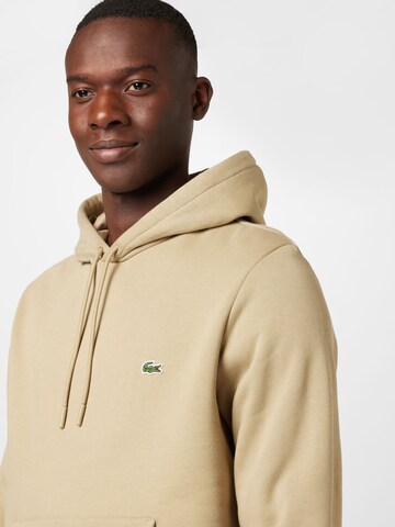 Felpa di LACOSTE in marrone