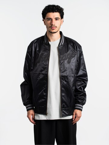 Mitchell & Ness Between-Season Jacket in Black: front