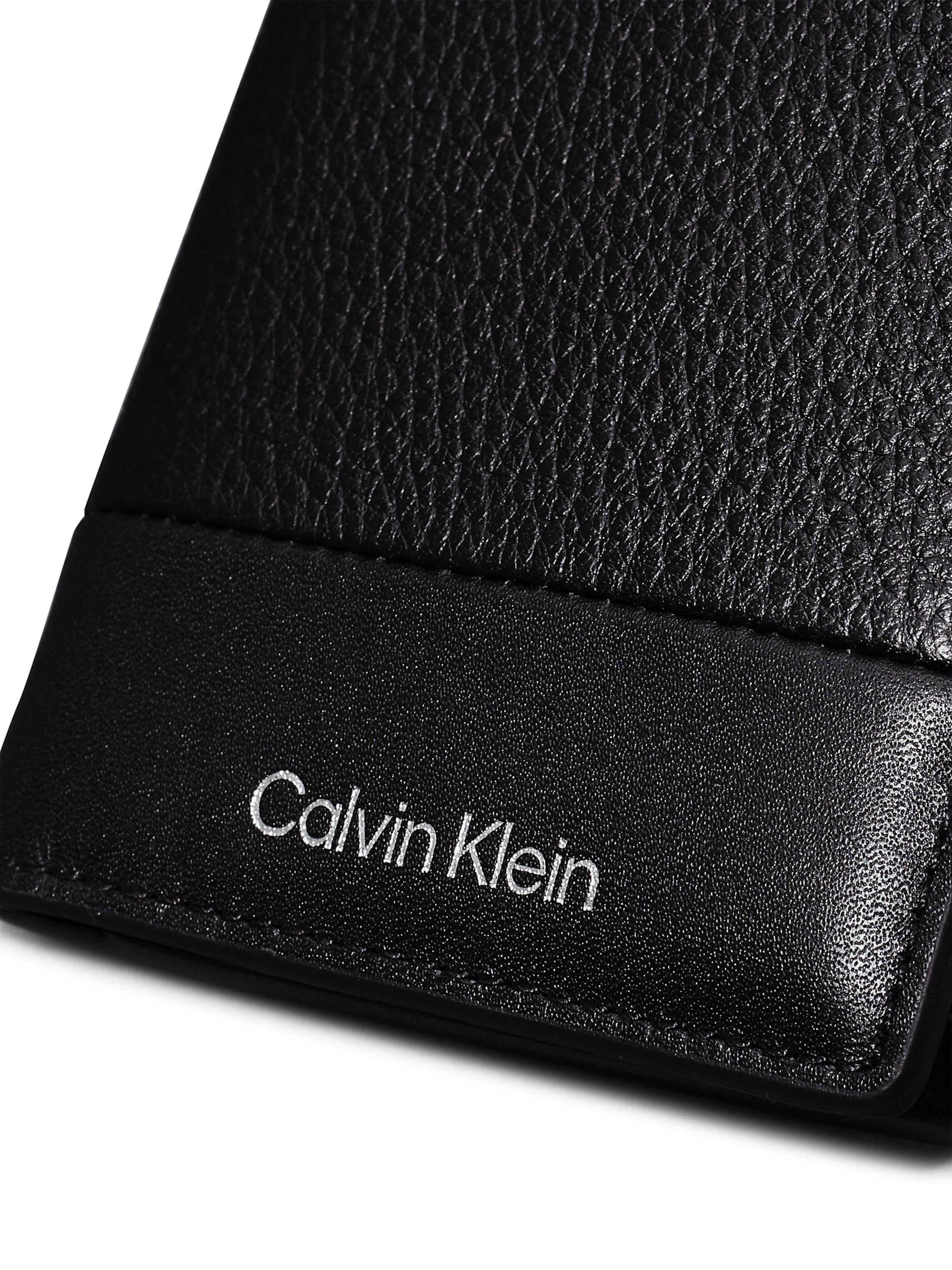 Calvin klein passport wallet hotsell