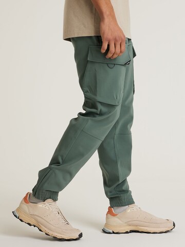 Regular Pantalon cargo 'Rift Flow' CHASIN' en vert