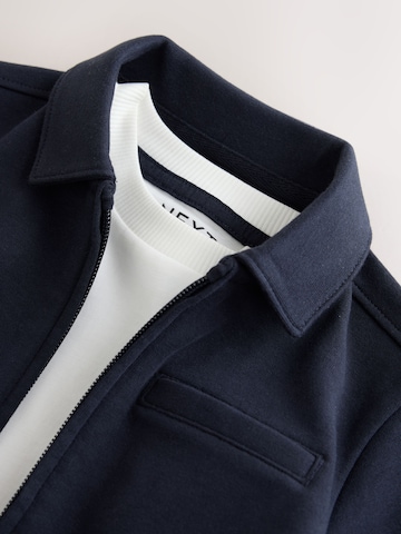 Set Next en bleu