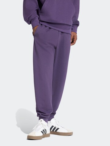 ADIDAS SPORTSWEAR Tapered Sports trousers in Purple: front