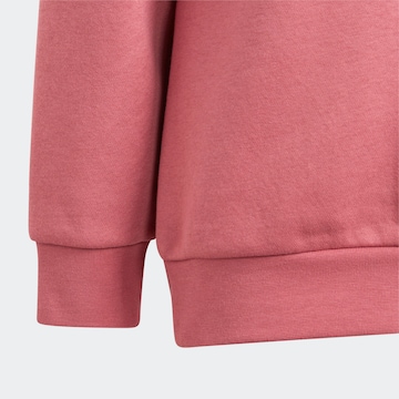 ADIDAS ORIGINALS Träningsoverall 'Adicolor' i rosa