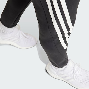 juoda ADIDAS SPORTSWEAR Siaurėjantis Sportinės kelnės 'Future Icons'