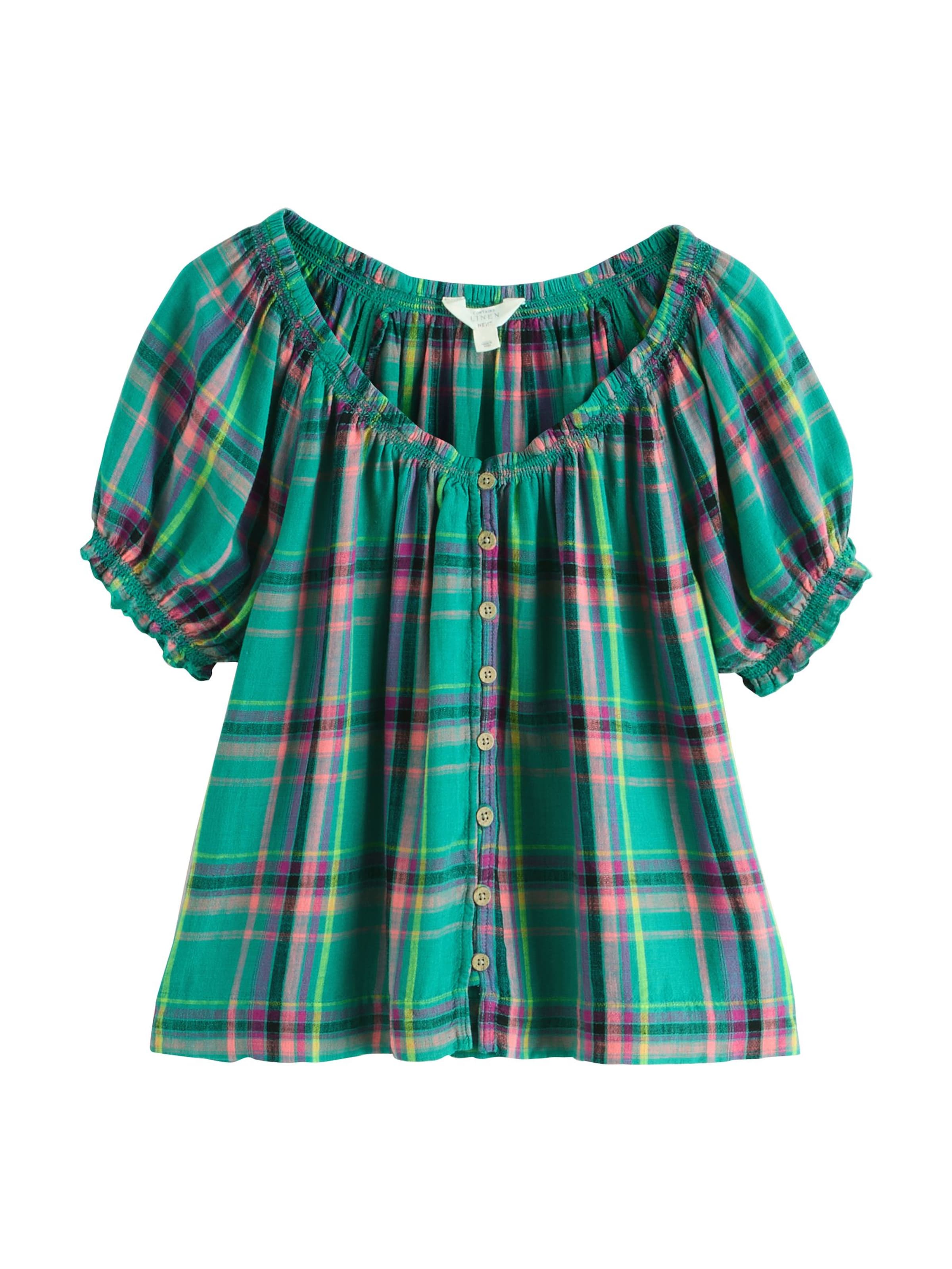 Next Blus i grön: framsida