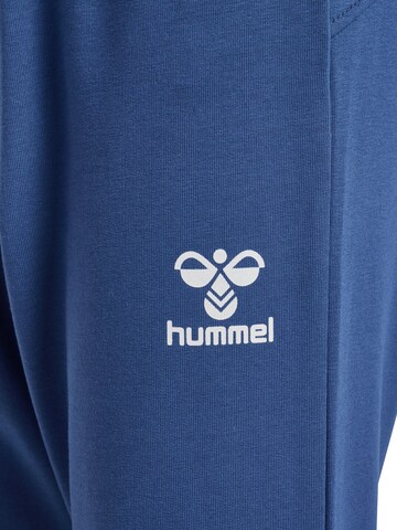 Hummel Tapered Sports trousers in Blue
