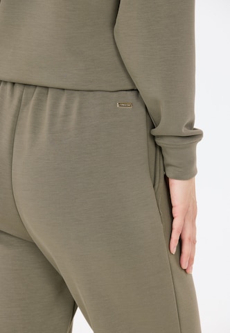 Athlecia Tapered Sports trousers 'Jacey' in Green
