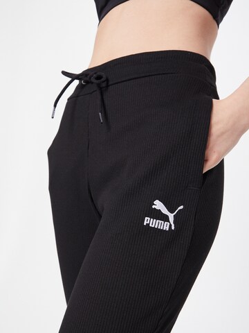 PUMA Tapered Broek in Zwart