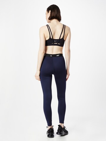 Skinny Pantaloni sportivi di 4F in blu