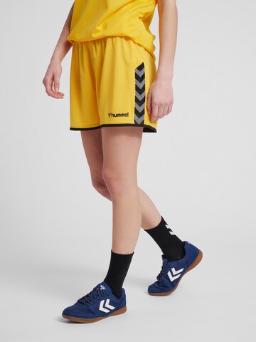 Hummel Regular Sportbroek 'Poly' in Geel: voorkant