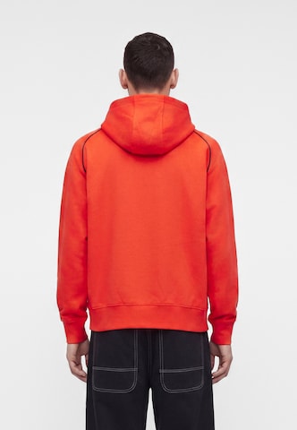 Sweat-shirt 'AIR' Nike Sportswear en rouge