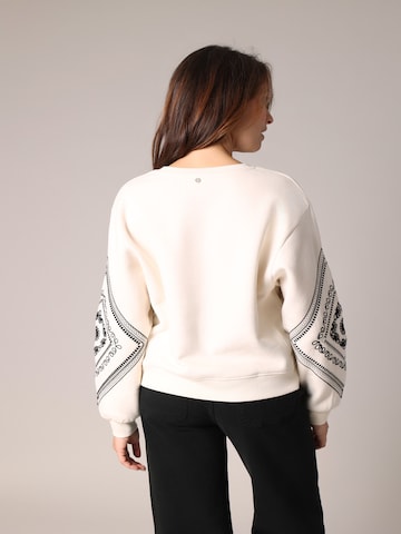 Sweat-shirt 'NERIKA' Deeluxe en beige