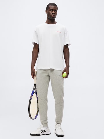 BJÖRN BORG - Tapered Calças de desporto 'ESSENTIAL 1' em cinzento