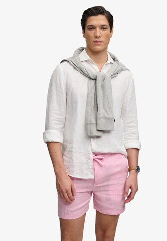 Coupe slim Pantalon 'Merchant Store' Superdry & Co en rose