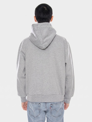CAT Bluzka sportowa 'Unit Hoodie -- Men's Sweatshirt Light Heather Grey Men's' w kolorze szary