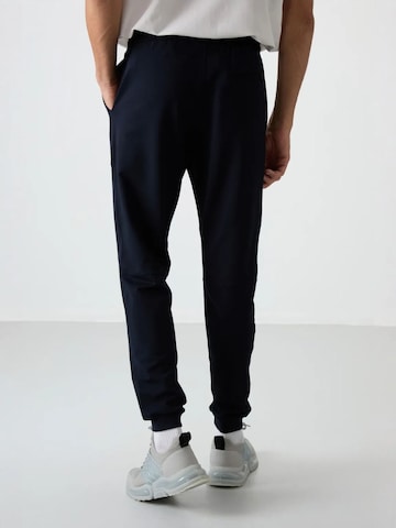 Regular Pantalon de sport Tommy Life en noir