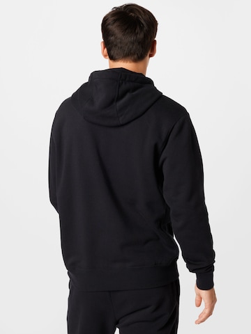 Nike Sportswear Trainingspak in Zwart