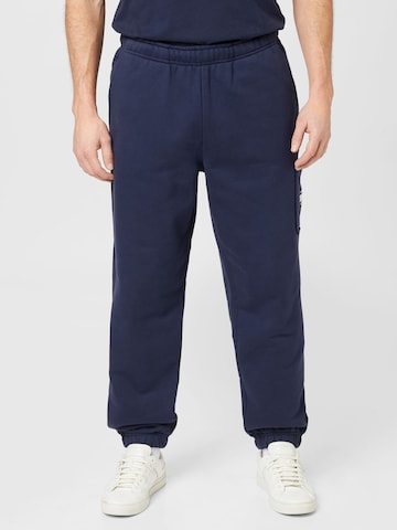 Tommy Jeans Lużny krój Spodnie w kolorze niebieski: przód