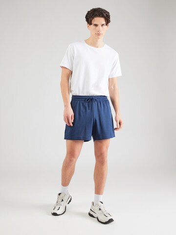 regular Pantaloni 'Essentials' di new balance in blu
