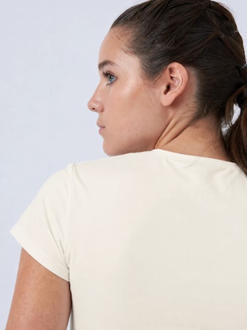 T-shirt fonctionnel 'V-Neck' SPORTKIND en blanc