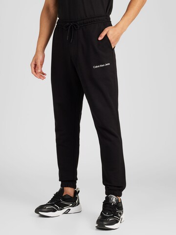 Tapered Pantaloni di Calvin Klein Jeans in nero: frontale