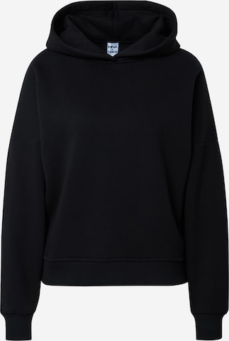 Sweat-shirt 'Alessia' ABOUT YOU x INNA en noir : devant