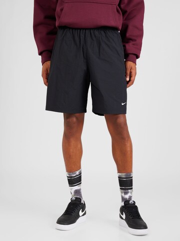 Nike Sportswear - Regular Calças 'Solo Swoosh' em preto: frente