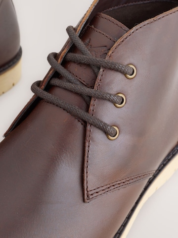 Next Chukka boots in Brown