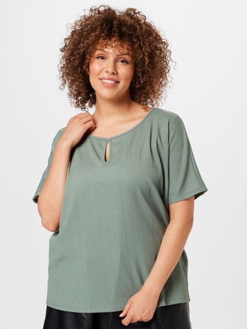 EVOKED - Camiseta 'NEYA' en verde: frente