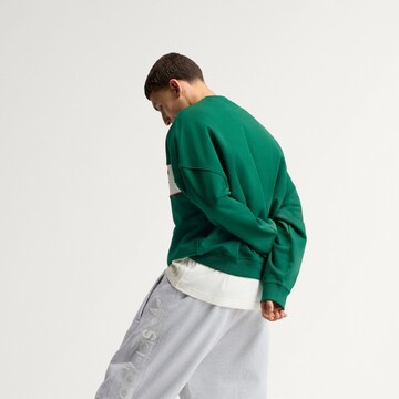 ADIDAS ORIGINALS - Sweatshirt 'AdiSignature NY' em verde