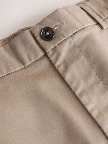 Next Normalny krój Chinosy w kolorze brązowy