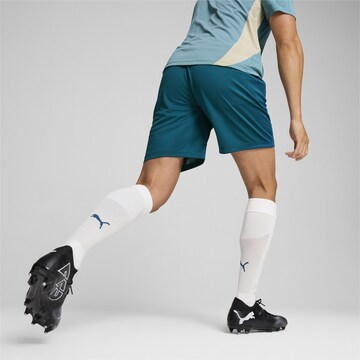 PUMA Regular Sporthose 'Olympique de Marseille' in Blau
