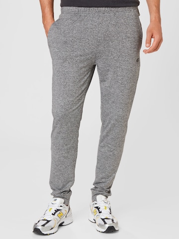 Effilé Pantalon de sport 4F en gris : devant