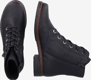 Rieker - Botines con cordones en negro