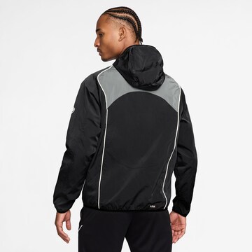 NIKE Between-Season Jacket 'Total 90' in Black