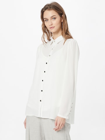 Wallis Blus i beige: framsida