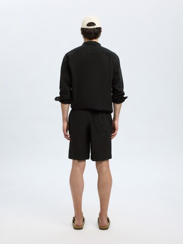 SELECTED HOMME Loosefit Nadrág 'SLHMAGNUS' - fekete