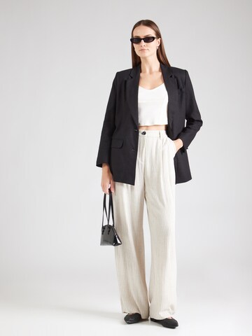 Loosefit Pantaloni con pieghe 'Tyler' di Lollys Laundry in beige