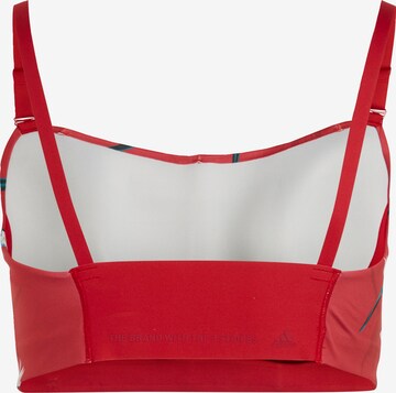 ADIDAS SPORTSWEAR Bustier Urheilurintaliivit 'Thebe Magugu Studio Light-Support ' värissä punainen