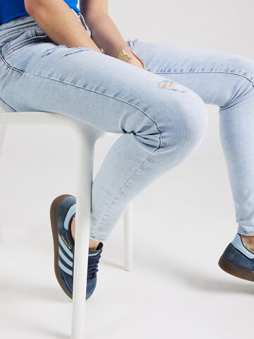 Skinny Jean 'CORAL' ONLY en bleu