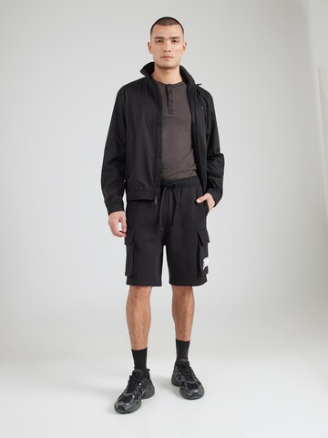 Champion Authentic Athletic Apparel Regular Gargohousut värissä musta