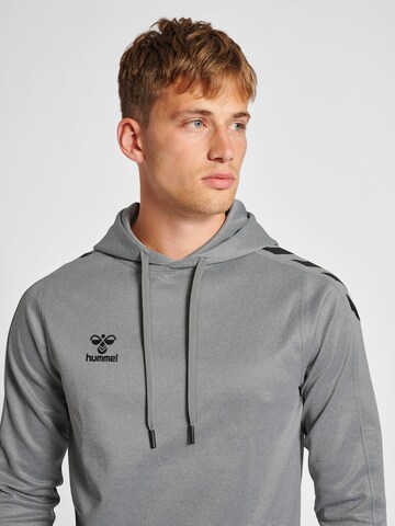 Hummel - Sweatshirt de desporto em cinzento